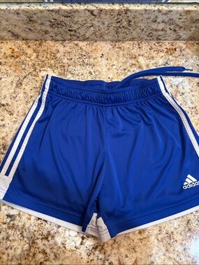 Women’s blue Adidas Tastigo 19 athletic shorts